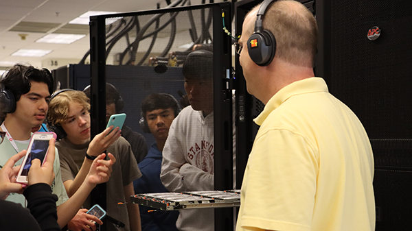 Students taking photos of OSC's machines at the data center