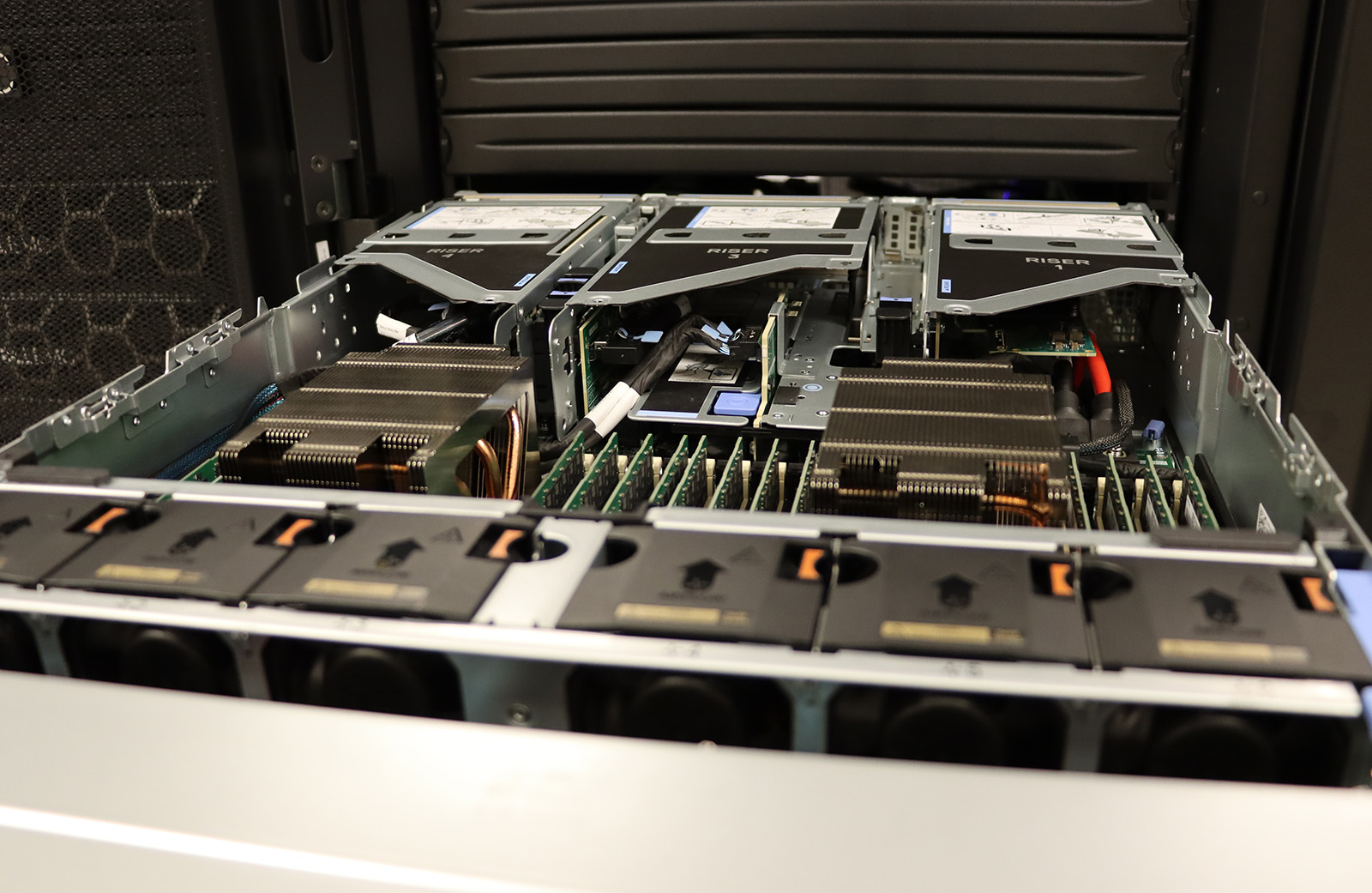 A view inside the test node in OSC's data center in Columbus, Ohio. Visible components include air intake fans, RAM memory modules and heat sinks.