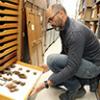 Bryan Carstens examines bat specimens