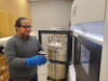 Dr. Emre Firlar loading cryopreserved specimens into the electron microscope at the Rutgers Cryo-EM & Nanoimaging Facility