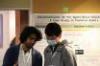 Two individuals conversing during poster presentations at 2022 ICICLE All Hands Meeting.
