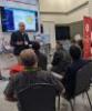 OSC’s Alan Chalker discusses Open OnDemand at OSC's booth during SC22.